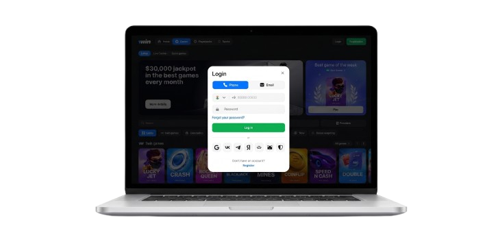 laptop displaying an open 1win login form on the screen